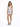 A model poses in a fitted silver dress with a ruched design and thin straps, paired with black high heels.
