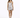 A model poses in a silver, form-fitting dress with a ruched design and thin straps, paired with black heels.
