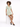 A model poses in a light green textured dress with a collar, paired with black open-toe heels.