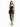 A model poses in a fitted black leather dress with a thigh-high slit and thin straps, paired with nude heels.