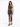 A model poses in a black sequined two-piece outfit featuring a cropped top and a high-slit skirt.