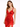 A model poses in a red satin dress with a plunging neckline and ruched detailing, showcasing elegant style.