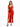 A model poses in a sleek red satin dress with a deep neckline and a thigh-high slit, paired with black heels.