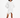 A model poses in a white hooded garment with unique side cutouts and metal ring accents, showcasing a modern style.