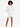 A model poses in a white hooded garment with unique side cutouts and metal ring accents, showcasing a modern style.