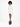 A model stands in a white hooded dress with side details, paired with black ankle boots on a plain background.