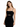 A woman poses in a fitted black dress with thin straps and a stylish cutout at the waist.