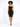 A model poses in a strapless black dress featuring gold zipper details and thigh-high slits, paired with black heels.