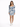 A woman stands in a fitted dress with puffed sleeves, featuring a blue floral pattern on a white background.