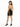 A woman stands in a fitted black dress with gold stripes, paired with black high heels, showcasing a halter neck design.