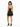 A woman stands in a black, sparkly dress with a ruffled hem, showcasing a halter neck and high-heeled sandals.
