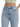 Light blue high-waisted jeans with a button closure and front pockets, styled with a cropped top.