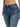 Close-up of a person wearing distressed blue denim jeans with a high waist and a button closure.