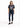 A woman stands confidently in a graphic t-shirt featuring a Florida design, paired with dark skinny jeans and black s...