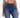 A close-up of a person wearing a white cropped top and dark blue fitted jeans, showcasing a casual style.