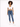 A model poses in a cropped white top and fitted blue jeans, paired with white sneakers against a plain background.