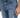 Close-up of blue denim jeans featuring a distressed design and a fitted silhouette, highlighting the front pockets an...