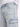 Light blue distressed jeans featuring frayed details and a side cargo pocket.