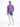 A man stands confidently in a purple t-shirt and light blue, distressed jeans with a tie-dye effect.