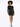 A model showcases a fitted black sequin dress with long sleeves and a boat neckline, paired with black heels.