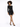A model poses in a fitted black sequined dress with long sleeves, paired with black high-heeled shoes.