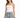 A woman stands confidently in light blue distressed jeans with a drawstring waist and a fitted white top.