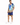 A man stands wearing a colorful short-sleeve shirt with a tropical design and matching blue shorts.