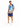 A man stands wearing a colorful short-sleeve shirt with a tropical design and matching blue shorts.
