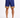 Navy blue shorts with a colorful geometric pattern at the hem, paired with white sneakers.