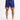 Navy blue shorts with a colorful geometric pattern at the hem, paired with white sneakers.