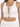 White cropped tank top featuring a lace-up front with gold eyelets and a tied bow detail at the hem.
