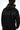 A person wearing a black hoodie with bold, stylized text on the back, showcasing a modern streetwear design.