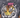 A close-up of a tie-dye tee featuring a colorful tiger graphic with striking yellow and orange details.