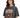 A woman with wavy hair wears a faded black t-shirt featuring an eagle graphic and bold text design.