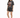 A model wearing a loose-fitting, dark graphic t-shirt paired with distressed black shorts and white sneakers.