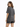 A woman with long hair wearing a loose-fitting, faded black t-shirt and distressed shorts, viewed from the back.