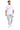 A man walks confidently in a white graphic t-shirt and light gray cargo pants, paired with white sneakers.