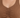 Close-up of a brown ribbed blouse featuring a v-neckline and gathered detailing at the center.