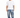 A man stands wearing a loose-fitting white t-shirt and light blue patchwork jeans, paired with white sneakers.