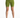 Form-fitting green shorts with a high waist, paired with white athletic shoes, displayed against a plain background.