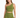A model poses in a fitted, one-shoulder green top paired with matching high-waisted shorts.