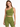 A model poses in a fitted, one-shoulder green top paired with matching high-waisted shorts.