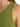 Close-up of a green sleeveless top, showcasing the smooth fabric and a relaxed fit around the shoulder area.
