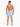 A man stands with his back to the camera, wearing blue and white striped swim shorts and sandals.