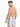 A man with short hair and a beard poses in swim trunks featuring a floral pattern, showcasing a relaxed fit.