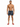 A shirtless man stands in swim trunks with a tropical leaf pattern, wearing red slide sandals.