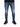 Skinny-fit blue jeans with distressed detailing and rips, paired with black sneakers.
