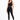 A model poses in a sleek black one-shoulder activewear top paired with matching leggings and sneakers.