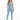 A model wearing a light blue one-shoulder crop top paired with matching leggings and white sneakers.