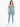 A model wearing a light blue one-shoulder bodysuit paired with matching leggings and white sneakers.